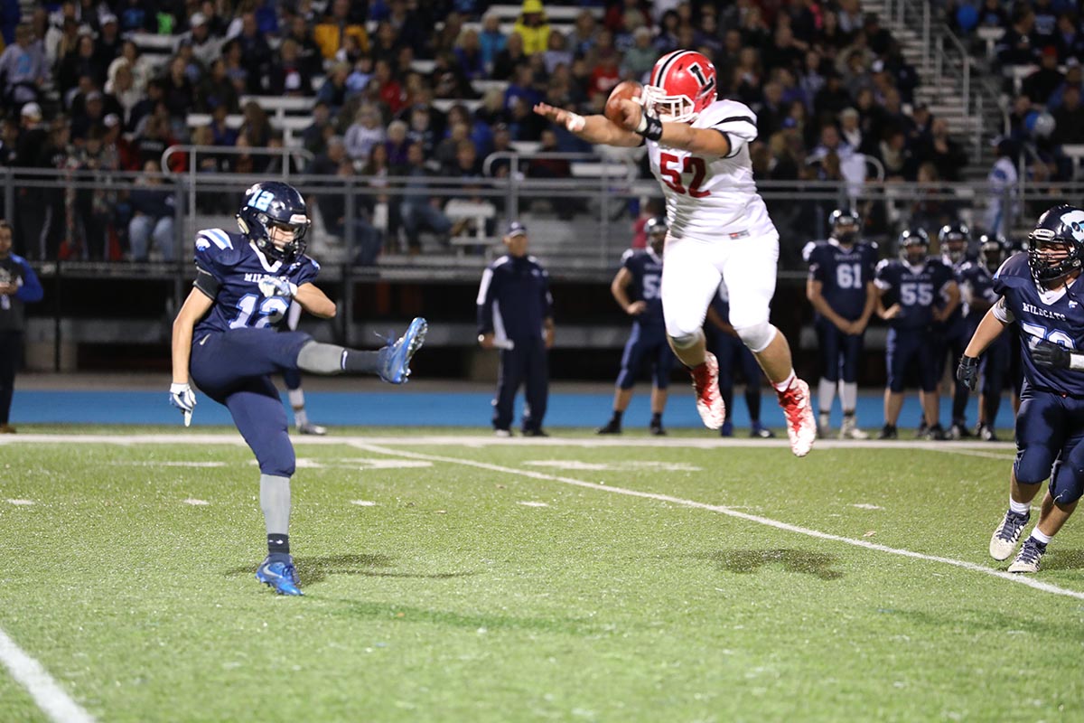 Lancaster trying to block the punt Celebration of the Legends Football team Lancaster Legends Football 10.13.17 Lancaster vs Depew