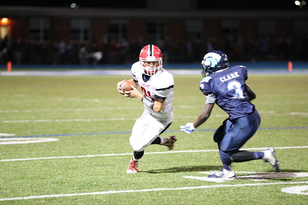 Lancaster player trying to shake off a Depew Defender Lancaster Legends Football 10.13.17 Lancaster vs Depew