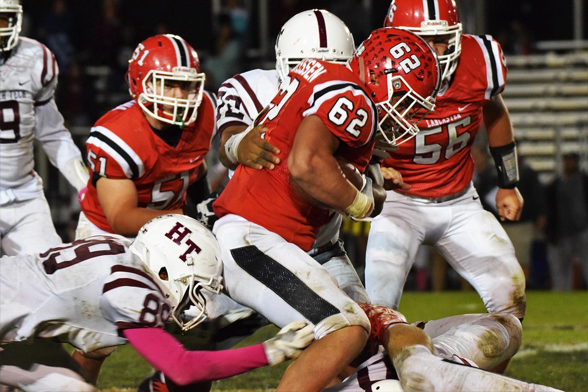 Trying to bring down the Lancaster RB Lancaster Legends Varsity Football vs Hutch Tech Engineers 10.20.17