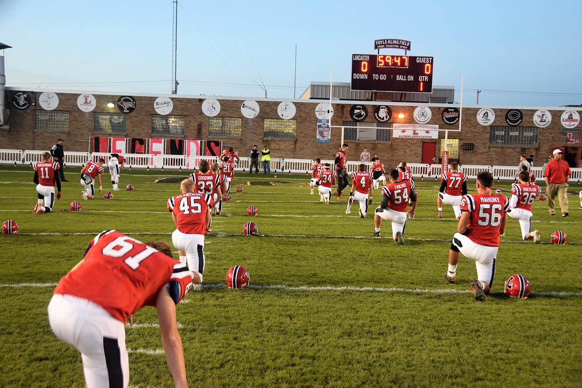 Legends Warming up Lancaster Legends Varsity Football vs Hutch Tech Engineers 10.20.17