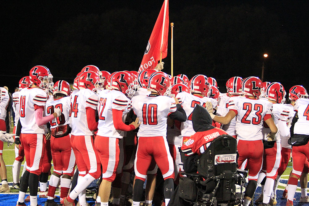 Lancaster huddle before the game