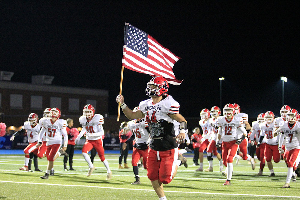 Lancaster running on the field