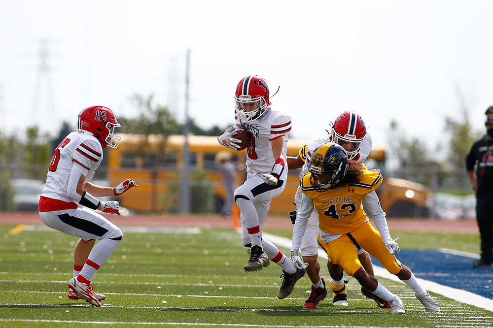 Lancaster vs Niagara Falls Jumping to get up the field