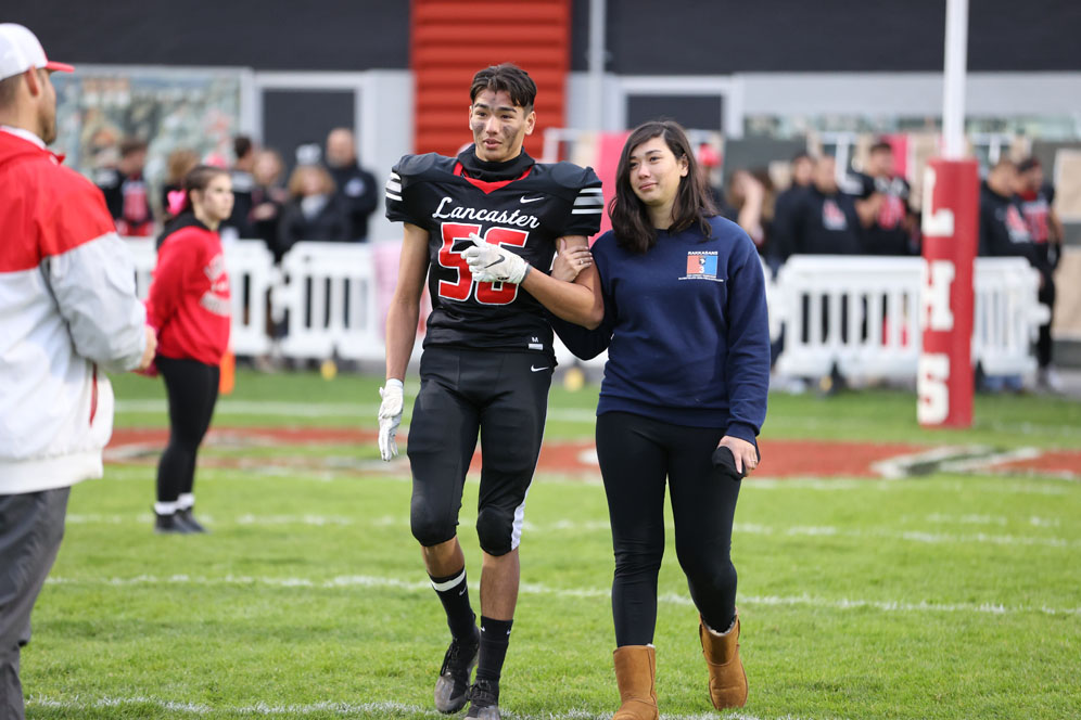 Lancaster Football Player Handy and Sister