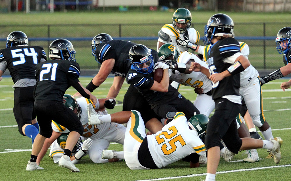 Frontier running the ball against Williamsville North defense