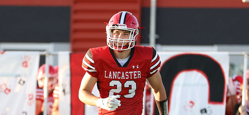 Aidan Willard running onto the field