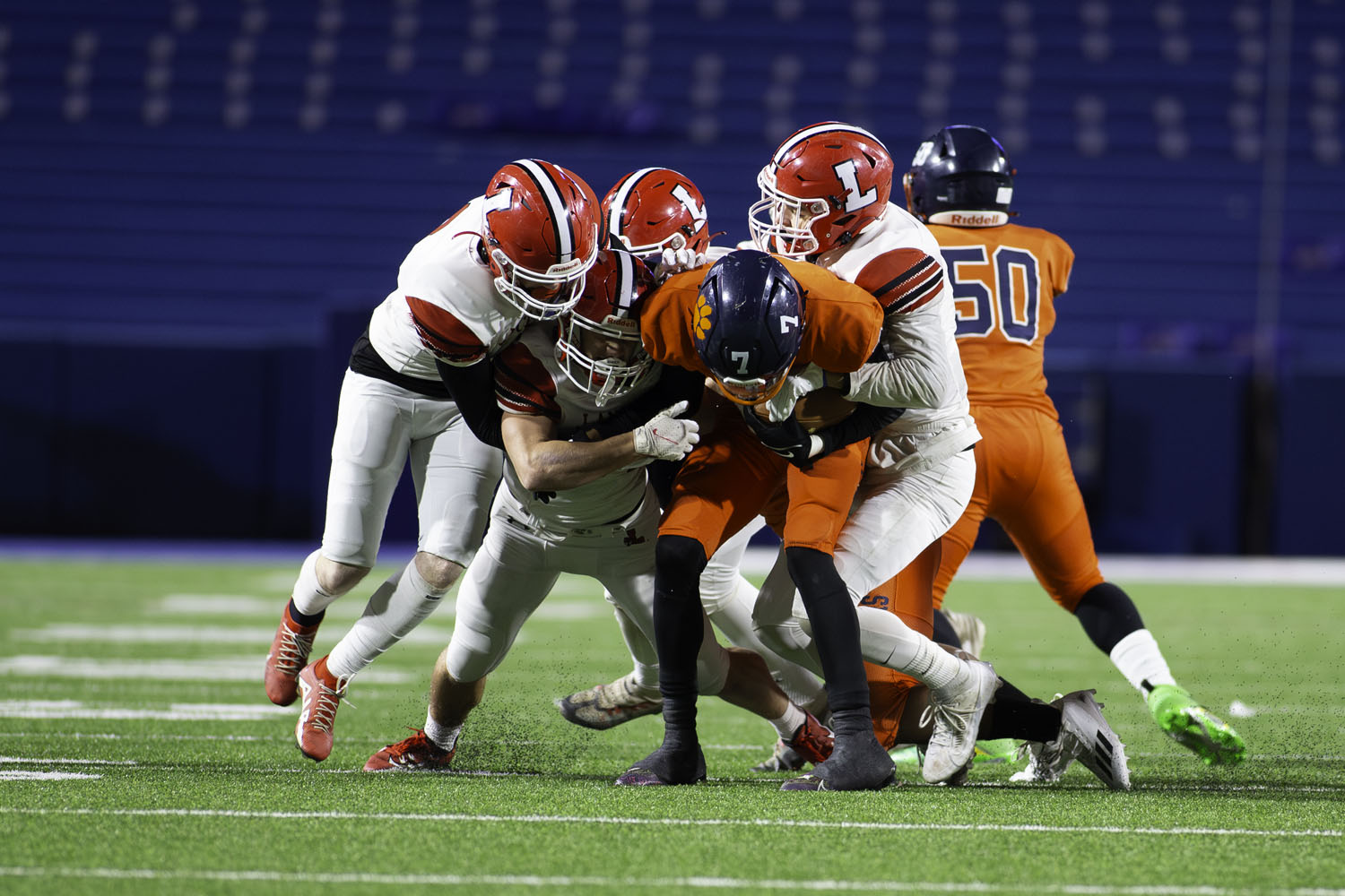 Gang tackle by the Legends against Bennett