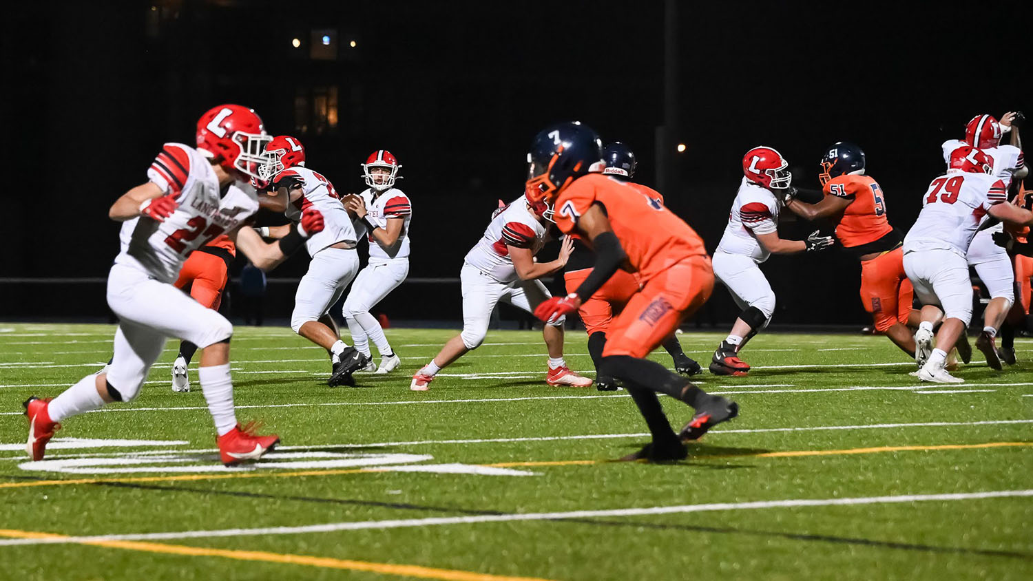 Quarterback looking down field