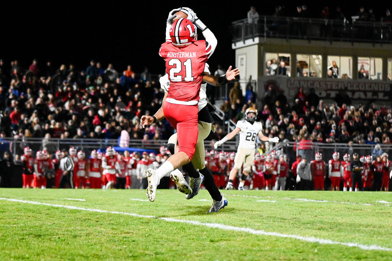 Minsterman going up for the catch against Canisius