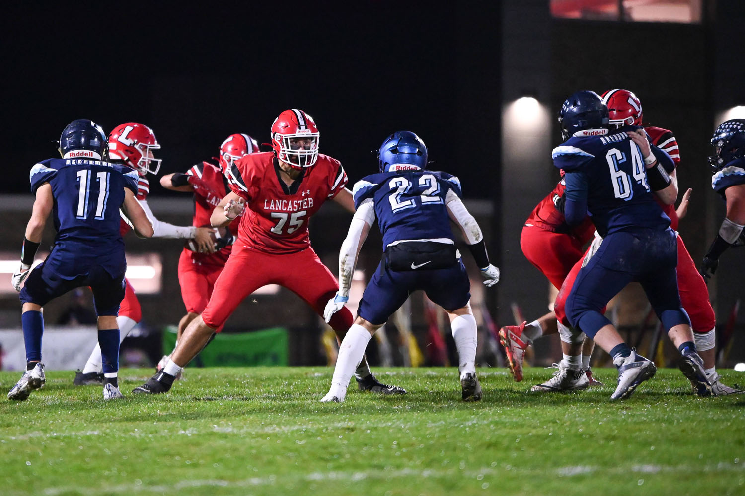 OL protecting his Quarterback and Running Back