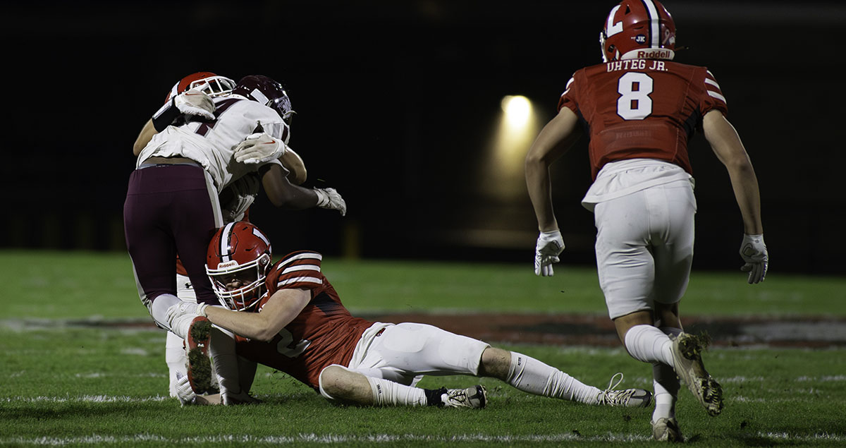 Lancaster making the tackle