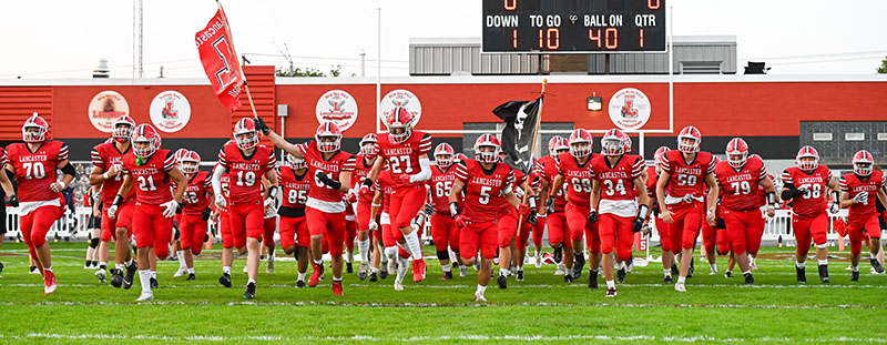 Lancaster Football being announced before the OP game