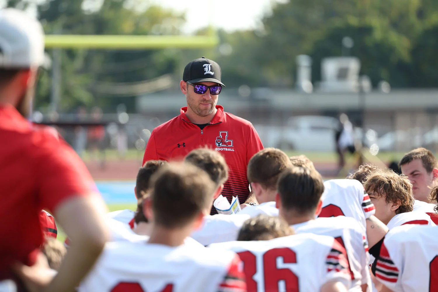 Coach Rupp talking to the team