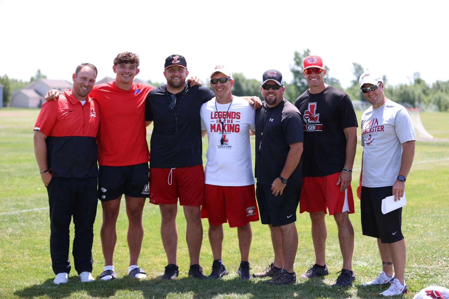 Lancaster coaches with Lancaster Alum and Buffalo Bill Joe Andreessen