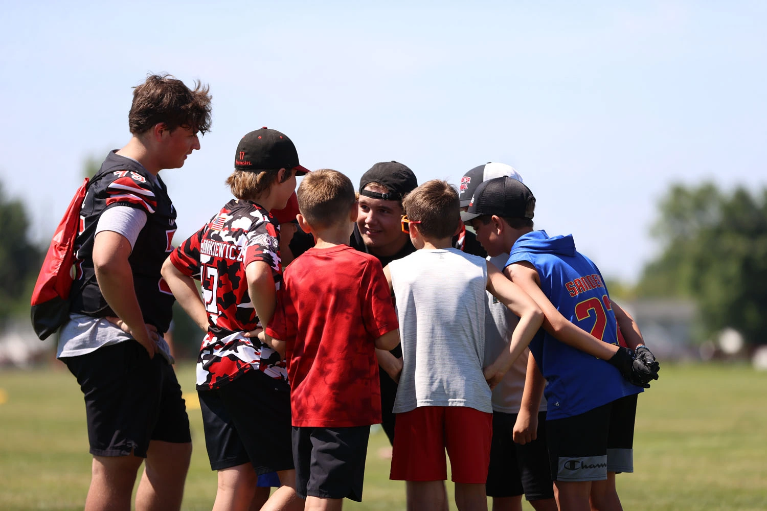 Team huddle with coach