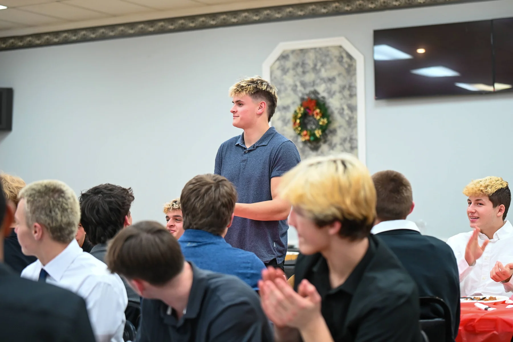 Daniel Ahearn standing at the banquet