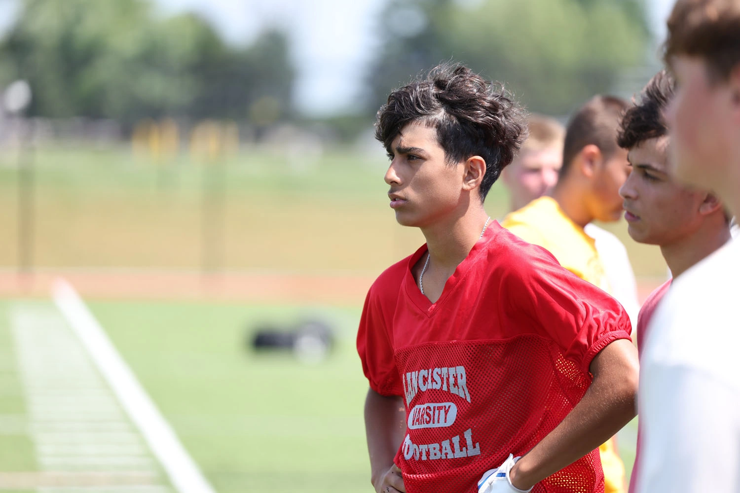 JV camper listening to coach