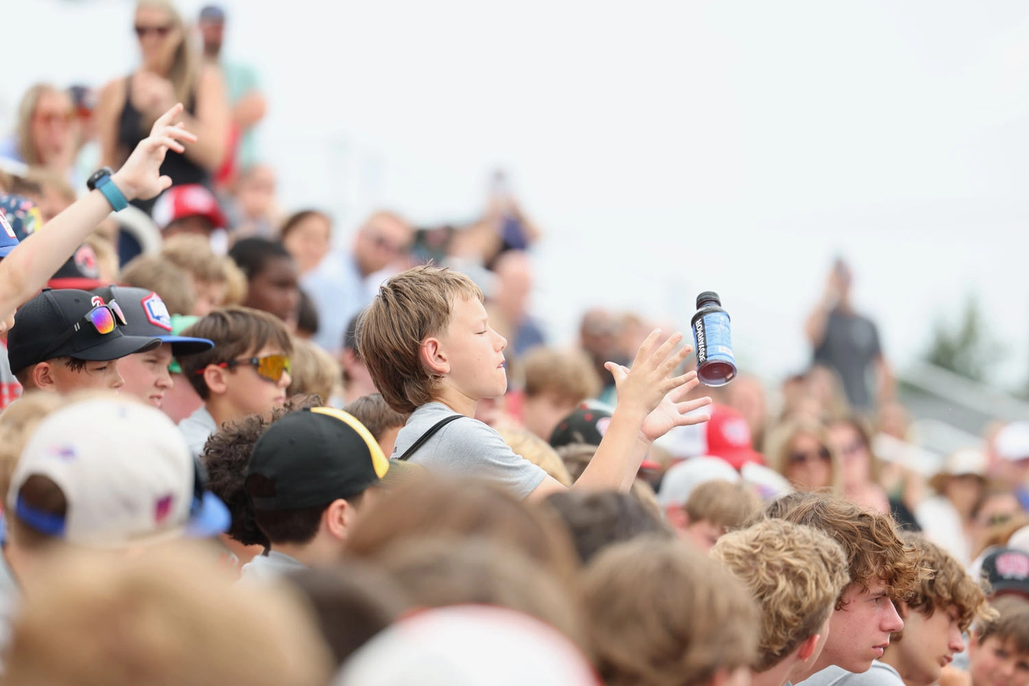 Camper catching his drink