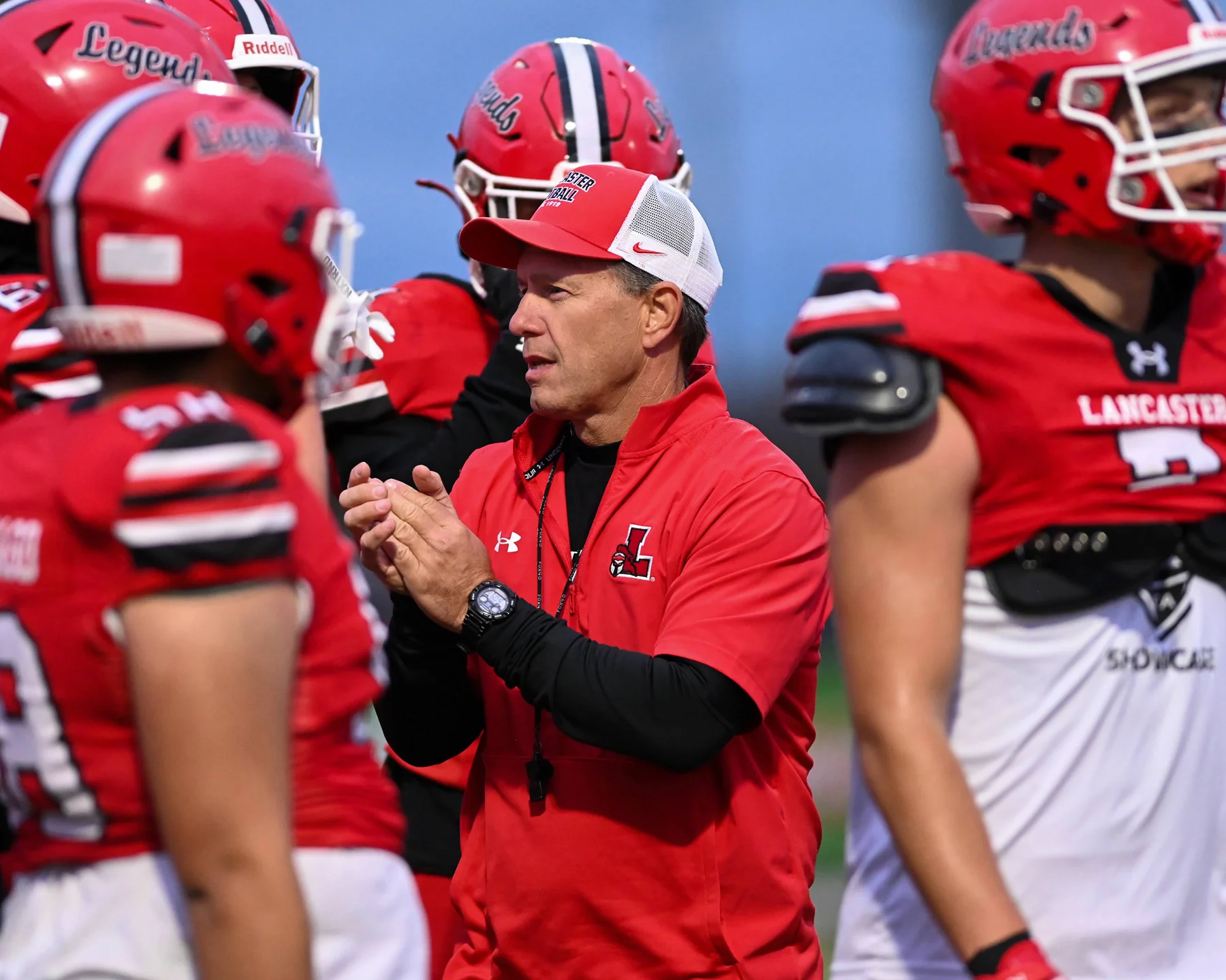 Coach Mansell clapping before the game
