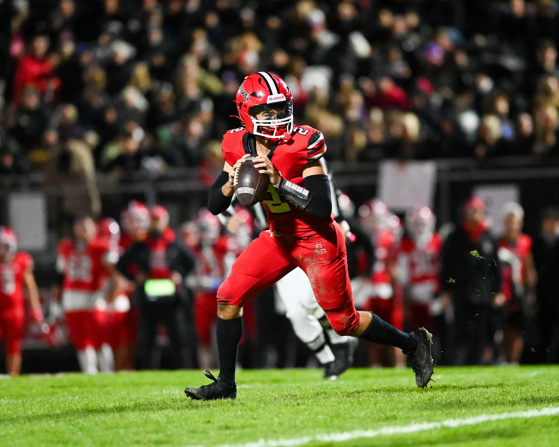 QB rolling out looking for the WR