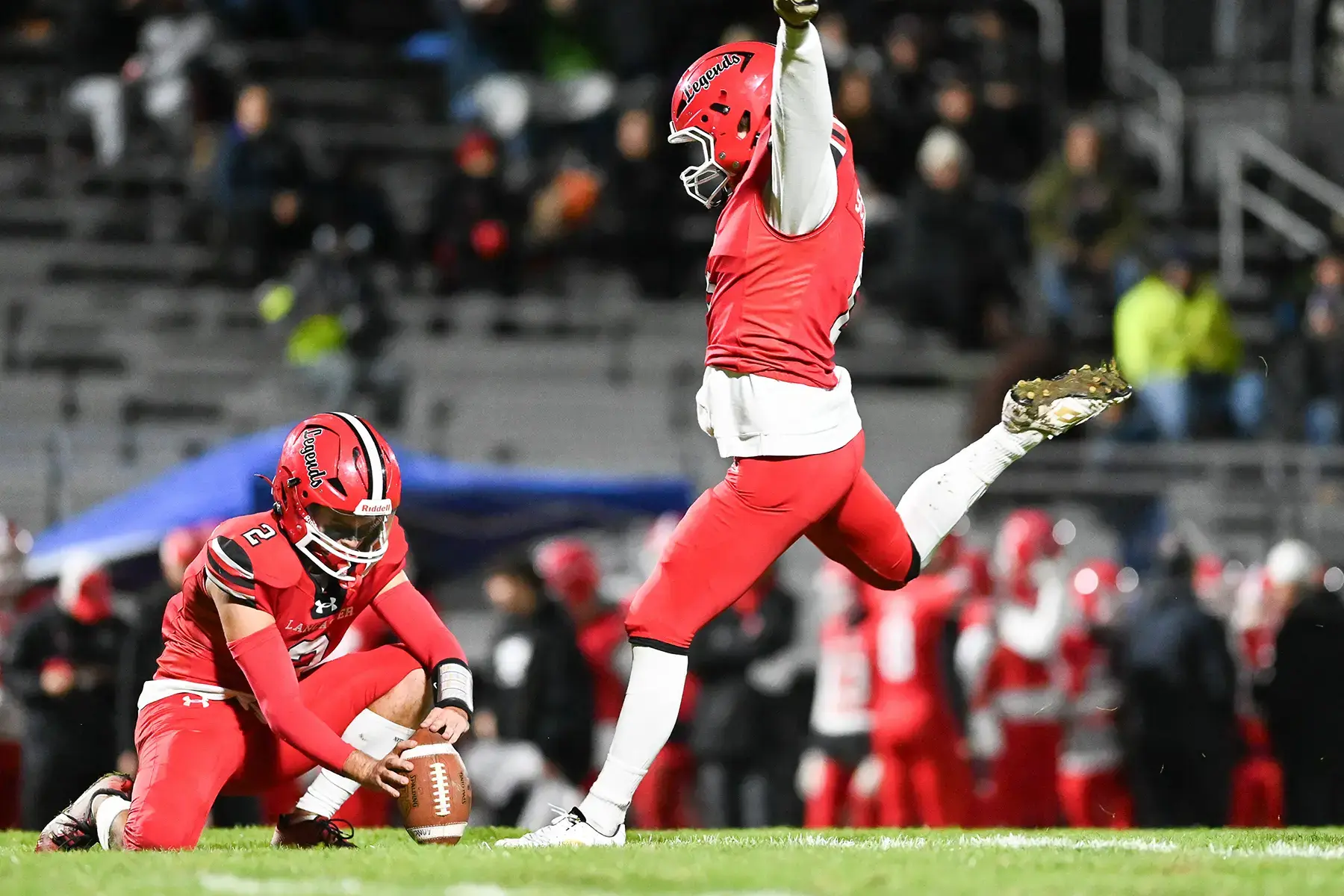 Lancaster FG kicker about to boot the ball