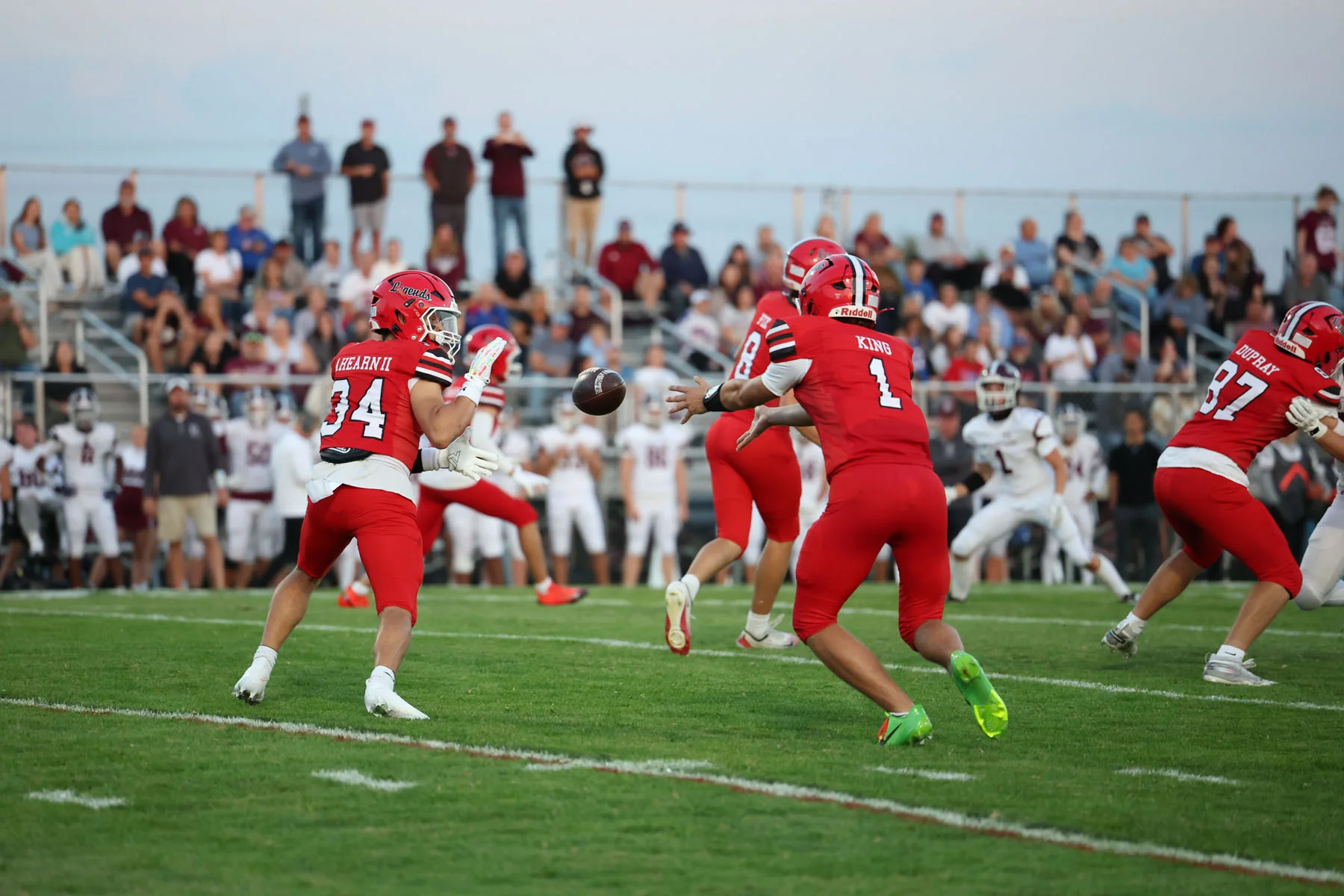 QB pitching the ball to the RB