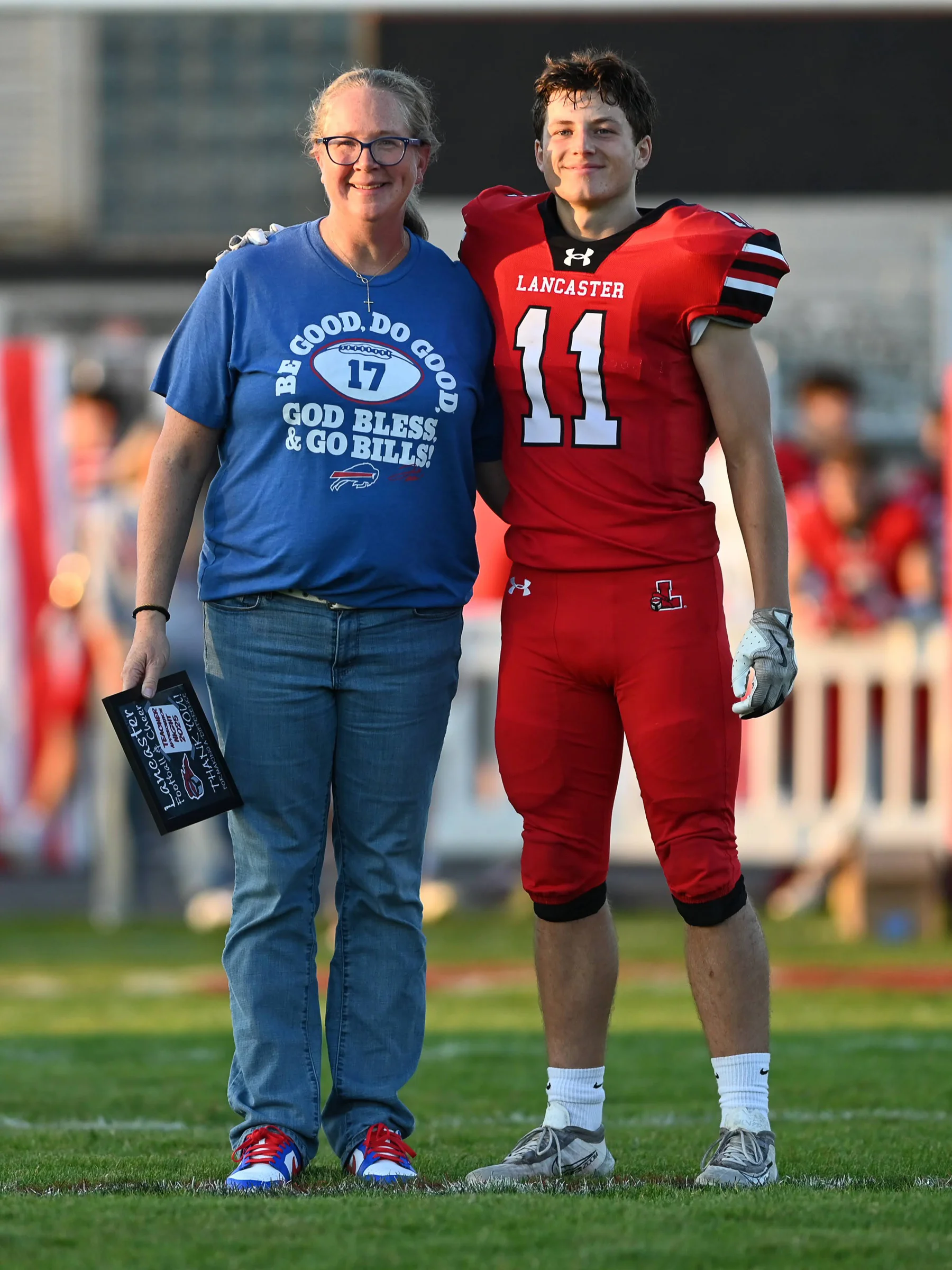 Ryan standing next to his favorite teacher