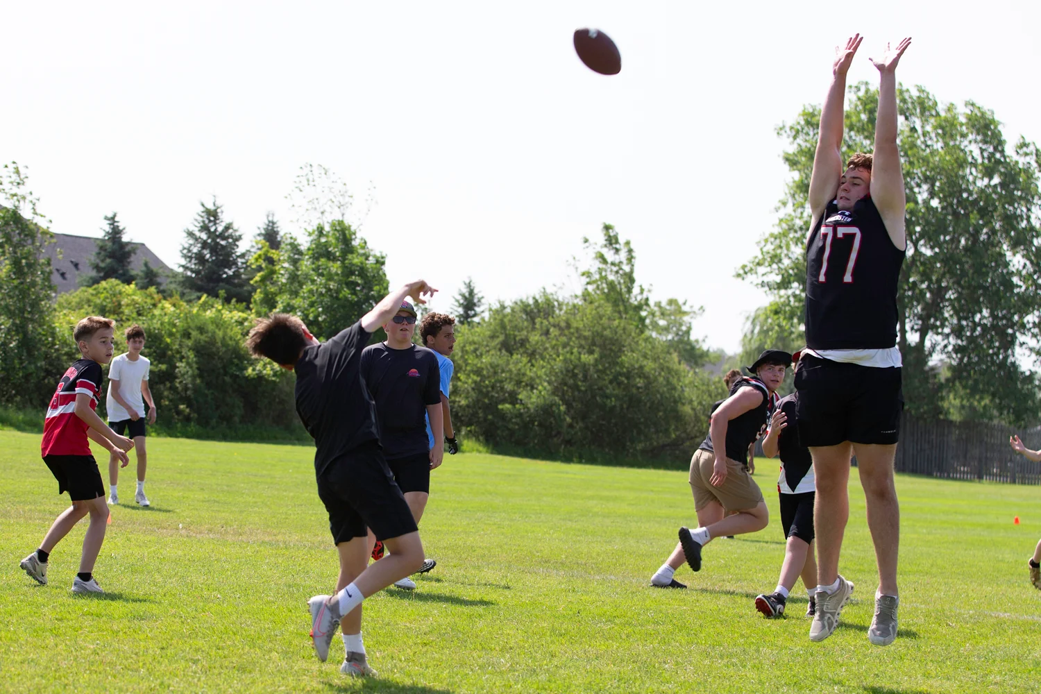 Throwing the ball over the Legend at the Lancaster Football Camp 2026