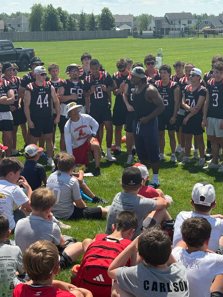 Brockport Player Darius Cervi speaking to the campers at the Lancaster Football Camp 2026