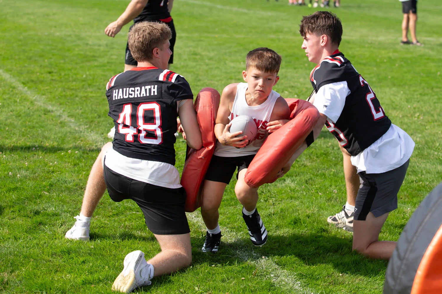 Busting through the hole at the Lancaster Football Camp 2026