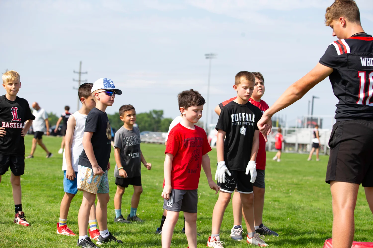 Campers getting coached up at the Lancaster Football Camp 2026