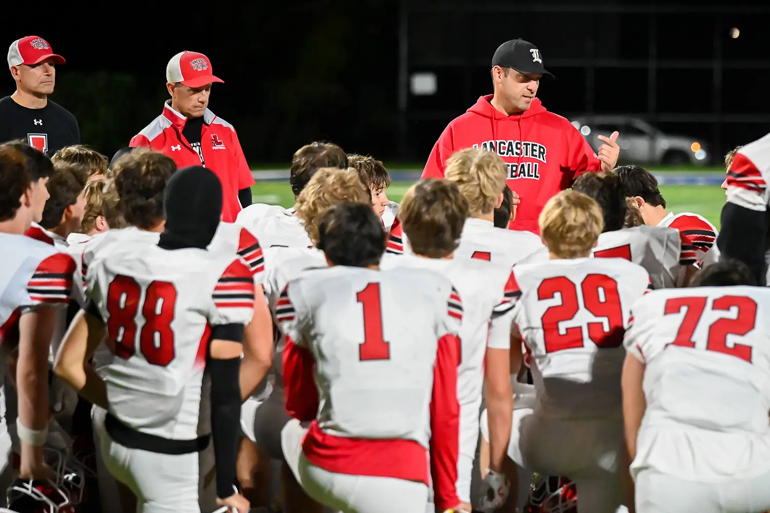 Coach Rupp with the post game talk with the team