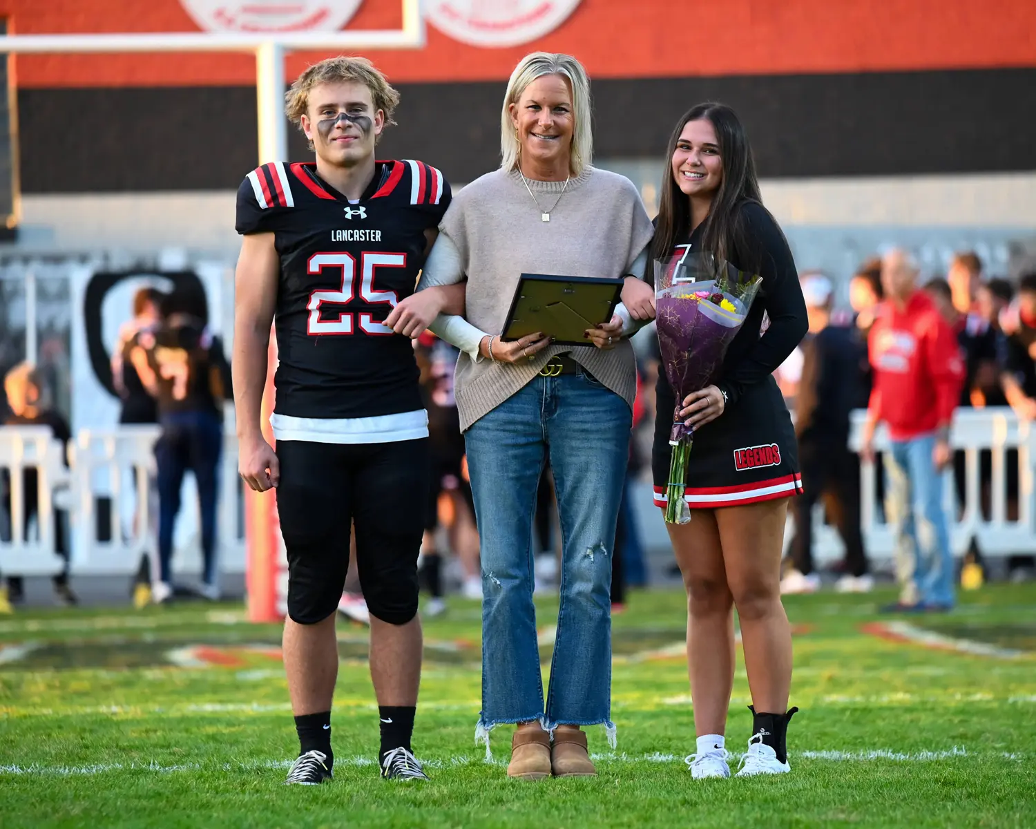 Teacher and Football Player on Teacher Appreciation Night