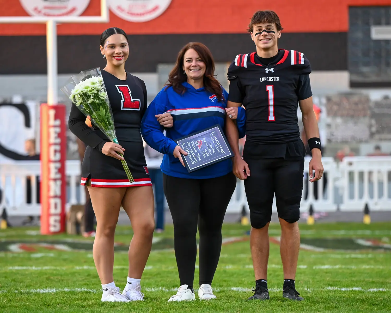 Cheerleader, Player, and Teacher on Teacher Appreciation Night