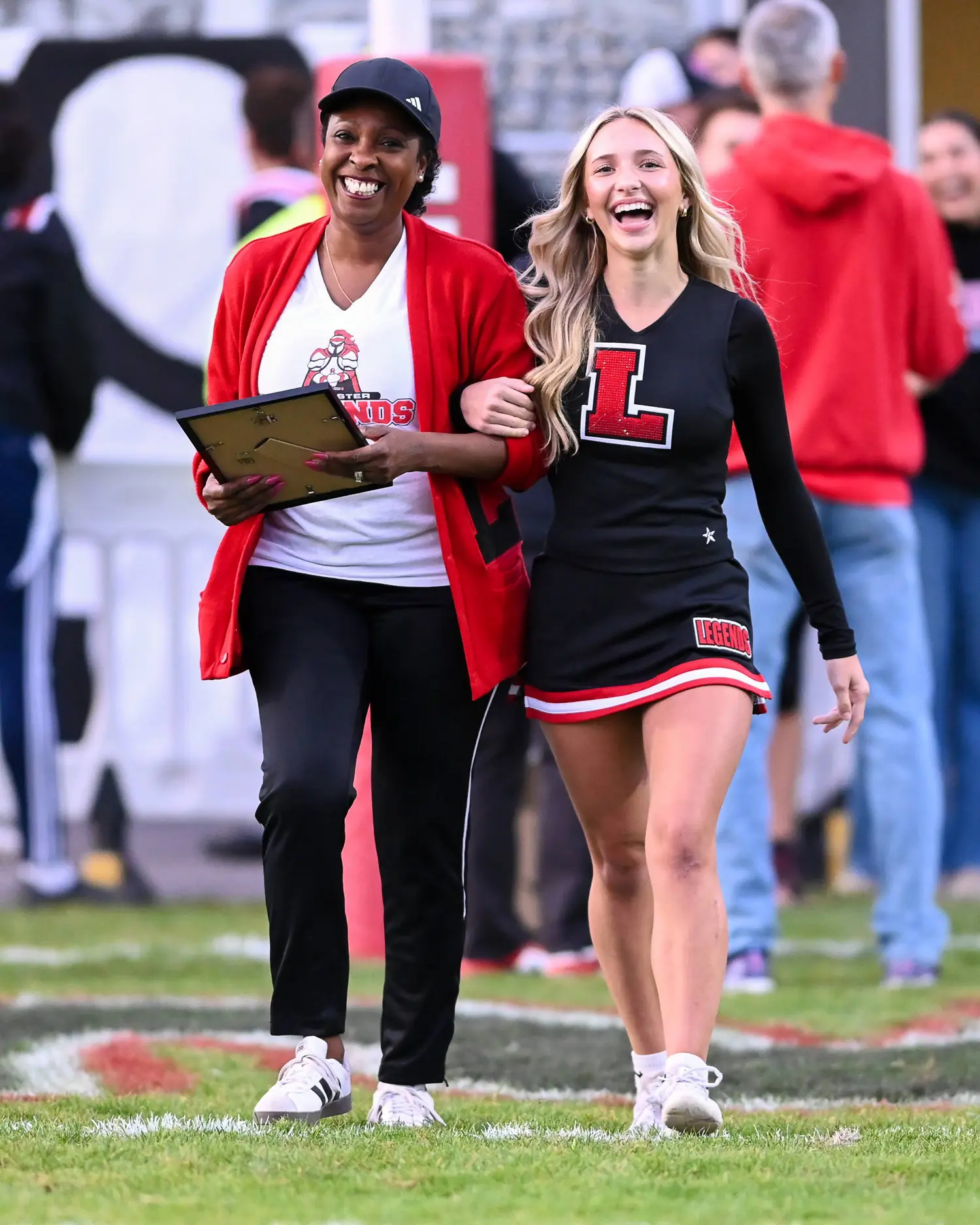 Cheerleader and Teacher on Teacher Appreciation Night