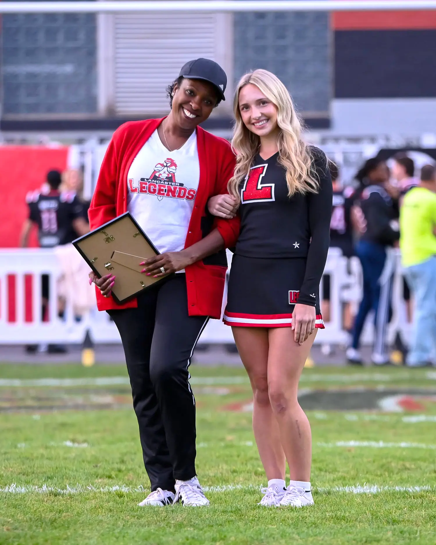Teacher and Cheerleader on Teacher Appreciation Night